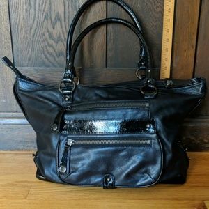 Perlina large black leather bag with patent accent